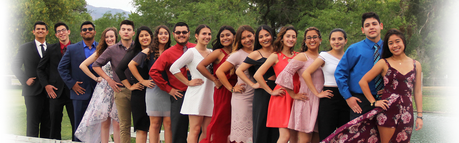 17 Smiling students posing outside